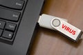 Virus USB thumb drive plug in to laptop computer port