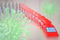 Viruses and falling dominoes with flag of Greece. Coronavirus spread conceptual 3D rendering