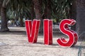 Vis, Croatia July 2021. City of Vis on the island of the same name. Big red letters in the harbour showcasing the tiny city