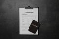 Visa application form for immigration and passport on grey table, top view Royalty Free Stock Photo