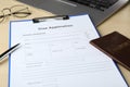Visa application form for immigration, passport and pen on table, closeup Royalty Free Stock Photo