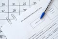 Visa application form to enter Japan and blue pen on paper calendar page Royalty Free Stock Photo
