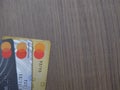 Visa card and mastercard cards over wooden background, elektonoc plastic card. Batam, Indonesia - March, 30, 2023