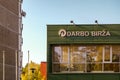 Visaginas Lithuania Oct 01 2018: Darbo birza logo on green wall building in town centre