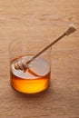 Viscous organic honey in glass with