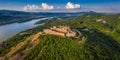 Visegrad, Hungary - Aerial panoramic drone view of the beautiful high castle of Visegrad with summer foliage and trees