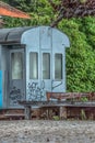 View of a abandoned older rustic train, wagon with graffiti street art