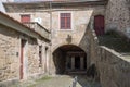 View at a classic traditional urban buildings on Viseu city Downtown, street tunnel under house, Portugal Royalty Free Stock Photo