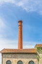 Viseu / Portugal - 04 16 2019 : View of the Museum of electricity, top building with chimney in industrial brick, Portugal