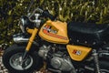 Yellow Honda Z50 or Z50A mini motorcycle with a 49cc motor. Royalty Free Stock Photo