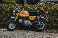 Viseu, Portugal - 08.09.2023: Yellow Honda Z50 or Z50A mini motorcycle with a 49cc motor. Royalty Free Stock Photo