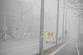 Visible air pollution at the streets of Belgrade, hazy foggy and polluted air and strong emission of CO2