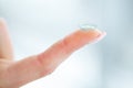 Vision Contact Lenses. Beautiful Woman Holds Finger on a Contact