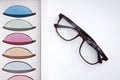 Vision glasses frame near many colorful ophthalmological lenses for eye protection
