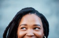 Vision, idea and portrait of eyes of woman looking, thinking and a smile on face. Cropped headshot of happy black woman