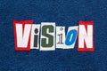 VISION word collage from cut tee shirt letters on denim, forward thinking