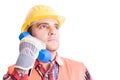 Visionary and confident builder using phone Royalty Free Stock Photo