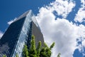 Visionary skyscraper surrounded by clouds Royalty Free Stock Photo