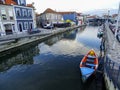 Visit Aveiro in north of Portugal, cute boat on Douro river and little houses. Royalty Free Stock Photo