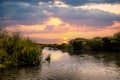 Visit the Courant d\'Huchet by boat at Moliets in southwest France at sunset