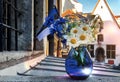 Estonian flag and  blue glass vase with wild blue white cornflowers and daisies  flowers , national Estonia republic symbol   , me Royalty Free Stock Photo