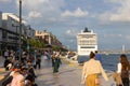 Visit Istanbul background photo. People walking by the seaside in Galataport