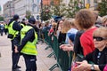 Visit of the royal couple in Warsaw. People holding Union Jack flags and flowers