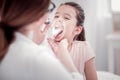 Pleasant cute young girl opening her mouth Royalty Free Stock Photo