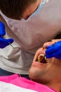 Visiting the dentist, the dentist evaluates the oral cavity and identifies problem areas of the teeth