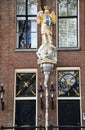 Fronts of Dutch houses - Boats tour through the canals in the Grachtengordel-West area of Amsterdam, Holland, Netherlands