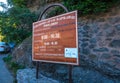 visiting hours sign of Holy Monastery of Saint Nicholas Anapafsas at Meteora, Greece