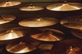 Visiting musical instrument store. Different types of drum cymbals for your ideal drum set. Music concept. Royalty Free Stock Photo