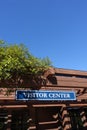 Visitor Center Sign with Blue Sky Background