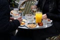 Visitor eating brunch in cafe