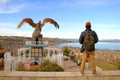 Visitor Enjoy the Aerial View of Lake Titicaca from Condor Hill Viewpoint or Mirador de Kuntur Wasi in Puno, Peru