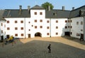 Visitor Exploring the Courtyard of Turku Castle, Turku, Finland Royalty Free Stock Photo