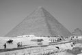 Visitor in front the great pyramid Royalty Free Stock Photo