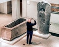 Visitor in front of Sarcophagus of Egypt pharaohs in Egyptian museum in Berlin, Germany