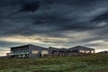 Visitor Gullfoss tourist centre with brandname shop, restaurant, souvenir and information service with dramatic sky on gloomy day Royalty Free Stock Photo