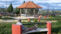 Visitor sits at the main square at the village of Karajia. Northern Peruvian Andes. KARAJIA , PERU - MARCH 31st, 2019 Royalty Free Stock Photo