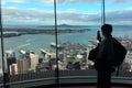 Visitor take photo with his mobile phone from Aucklands Sky Tow Royalty Free Stock Photo