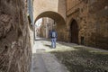 Visitor walking by Encarnacion Street at medieval old town of Pl Royalty Free Stock Photo