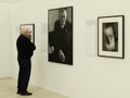 Visitor of XI Moscow International biennale looks on the portrait oÃÂ° Vakhtang Kikabidze, famous soviet actor