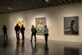Visitors admire paintings in Pompidou Centre in Malaga, Spain.