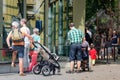 Visitors admiring apes in the zoo of Antwerp