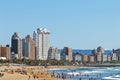 Visitors on beach Agaist City Skyline in Durban