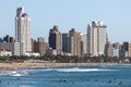 Visitors on beach Agaist City Skyline in Durban