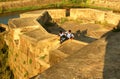 Visitors on the big fort battlement and large wall at vellore fort