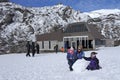 Visitors builds a snowman in Whakapapa skifield on Mount Ruapehu
