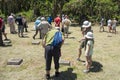 Visitors on cemetery of First World War in Rabaul, Papua New Guinea, looking at German graves, cemetery as reminder of peace